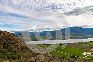 Osoyoos wineries next to river photo