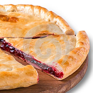 Ossetian pie with cherry isolated on white