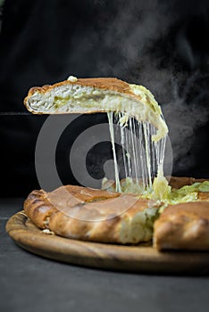 Ossetian pie is cut into pieces