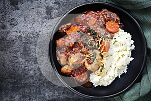 Osso Bucco Beef Stew with Potato Mash Top View on Slate