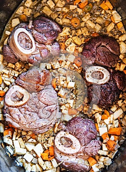 Osso buco in bianco veal meat photo