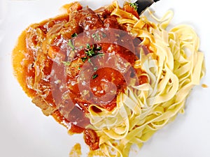 Osso Buco with italian pasta photo