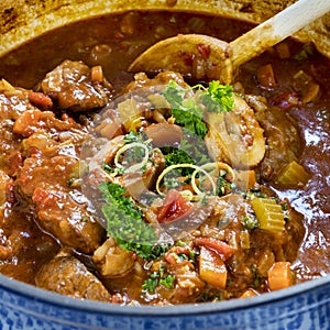 Osso Buco Veal Shanks in Casserole dish photo