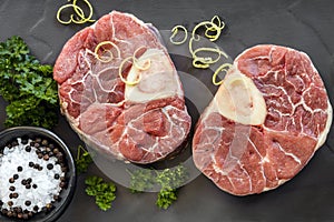 Osso Buco Veal Shanks Raw Top View on Slate photo