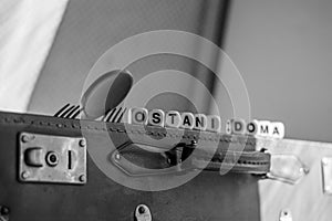 Ostani doma, old luggage. Abstract with forks and spoon photo