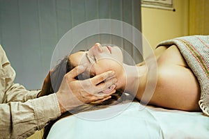 an osteopathic doctor conducts physiological and emotional therapy for a woman 6