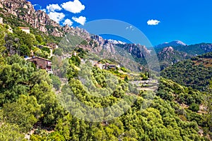 Ota town with the mountains in the background near Evisa and Porto, Corsica, France.