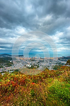 Otaru, Hokkaido, Japan town cityscape over Ishikari Bay photo