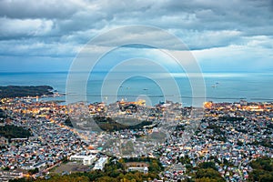 Otaru, Hokkaido, Japan town cityscape over Ishikari Bay photo