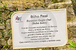 OTAVALO, ECUADOR - MAY 29, 2018: Outdoor view of informative sign of Eurasian eagle owl, Bubo bubo at Condor Park in