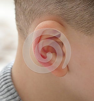 otitis media in children,a child occupies his ear,child with earache suffers,ear inflammation