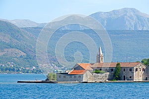 Otok Island Gospa od Milo with monastery of Jesuit Order, Tivat Bay, Montenegro photo