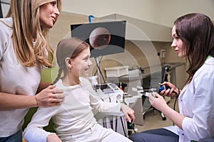 Otolaryngologist holds device for washing the nasopharynx in his hands