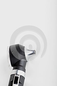 Otoscope on a white background