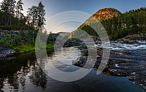 Otra river at sunset, Scandinavian landscape, Norway Bjornara Agder photo