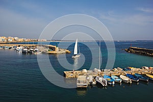 Otranto Harbour with sail and fish boats moored. Italy Puglia re