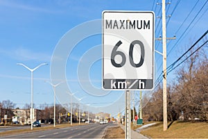 Ottawa, Canada - March 19, 2021: Speed limit road sign, 60 km h maximum