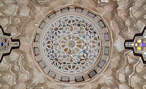 Carved plaster dome decorated with colored glass pieces of a pergola in front of El sehemy historical house, Cairo, Egypt photo