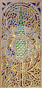 Ottoman era Perforated stucco window decorated with colorful stain glass with floral patterns