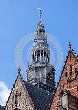 Oude Kerk (Old Church) in Amsterdam, Netherlands against blue sky