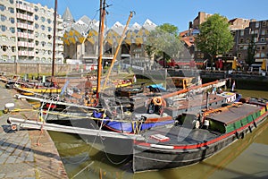 Oudehaven Harbor with colorful historical houseboats and Cube houses Kijk Kubus in the background, Rotterdam