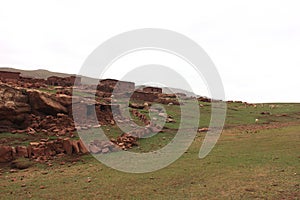 Oukaimeden, shepherds\' huts among mountains and green plains in autumn, Morocco