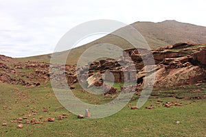 Oukaimeden, shepherds\' huts among mountains and green plains in autumn, Morocco