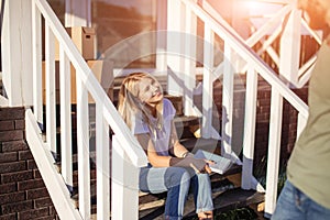 First home swith new home owners on step