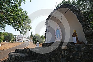 Our Lady of Lourdes Cave in front of St. Blaise Catholic Church in Gandaulim, Goa, India