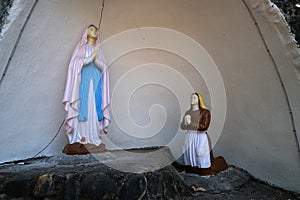 Our Lady of Lourdes Cave in front of St. Blaise Church in Gandaulim, Goa, India