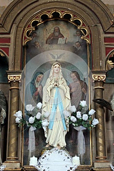 Our Lady of Lourdes, statue on the altar of the Holy Family in the church of the St Nicholas in Lijevi Dubrovcak, Croatia