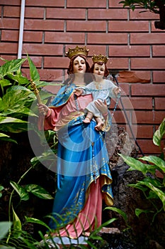 Our lady of perpetual help statue virgin Mary with Child Jesus in the church, Thailand. selective focus.