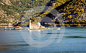 Our Lady of the Rock island and Church in Perast on shore of Boka Kotor bay ,Montenegro