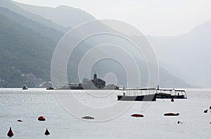 Our Lady of the Rock island view from Perast. Bay of Kotor. Montenegro photo