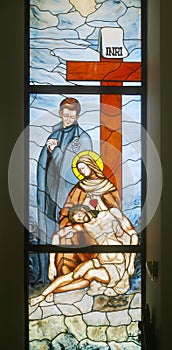 Our Lady of Sorrows, stained glass in the church of St. Anthony of Padua and Virgin Mary Queen of the Martyrs in Lasinja Croatia photo