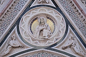 Our Lady of Sorrows supported by Angels bearing Flowers, Portal of Florence Cathedral