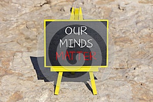 Our minds matter ourmindsmatter symbol. Concept words Our minds matter on beautiful black chalk blackboard. Beautiful stone
