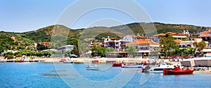 Ouranoupolis town panorama, harbor, boats at Athos, Greece