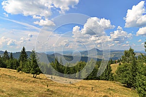 Landscape of the Rodnei Mountains and Ousorul Peak near Vatra Dornei, Romania photo