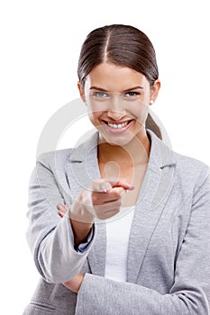 Out of billions of people, I choose you. Studio shot of a confident young woman pointing towards the camera against a