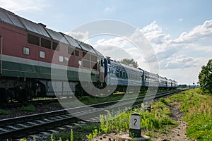 Out of date passenger train outside the city