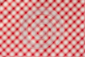 Out of focus background. Red plaid pattern.