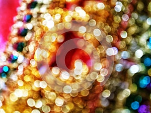 Out of Focus, Defocused, Blurred, Abstract and Bokeh of Sparkling Colorful Gold Lights, Suitable for Background Use