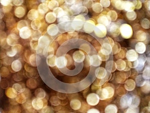 Out of Focus, Defocused, Blurred, Abstract and Bokeh of Sparkling Gold Lights, Suitable for Background Use