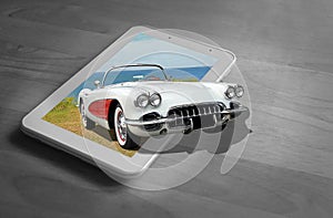 Out of frame vintage classic car computer tablet screen