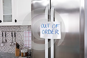 Out Of Order Text Stuck On Refrigerator photo