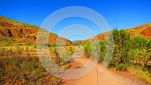 Outback australia - driving a 4x4 four wheel drive to camping spot near Lake Argyle