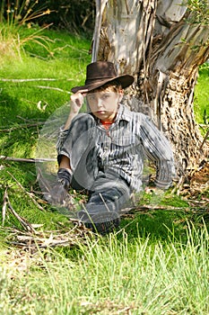 Outback boy in rugged bushland