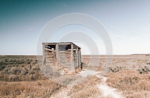 Outback dunny in arid desert of rural Australia