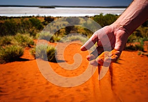 Outback red sand hand